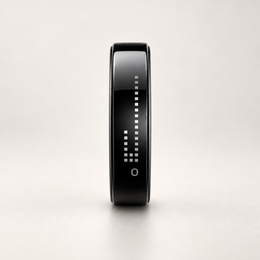 Pulse Display Smart Ring side profile view in a warm studio setting